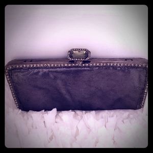 Leather clutch bag with strap
